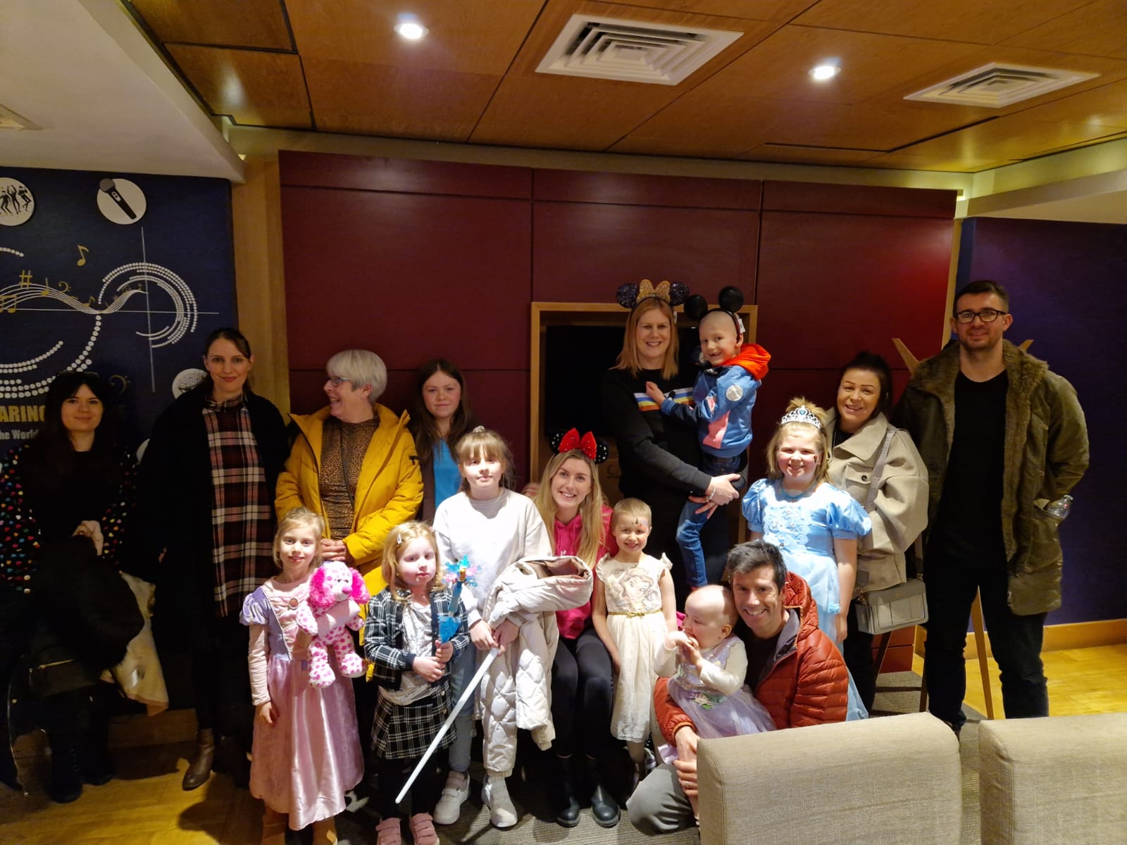 Families of Candlelighters visiting the private suit First Direct Arena for Disney On Ice.